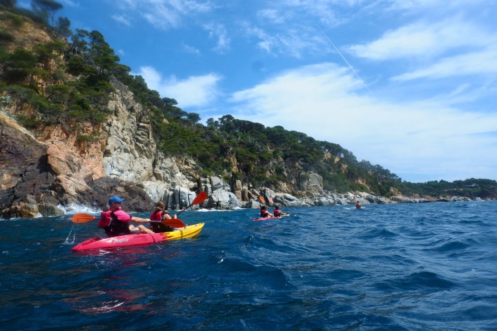 a group of people kayaking in Costa Brava