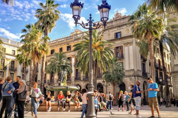 a group of people walking down the street