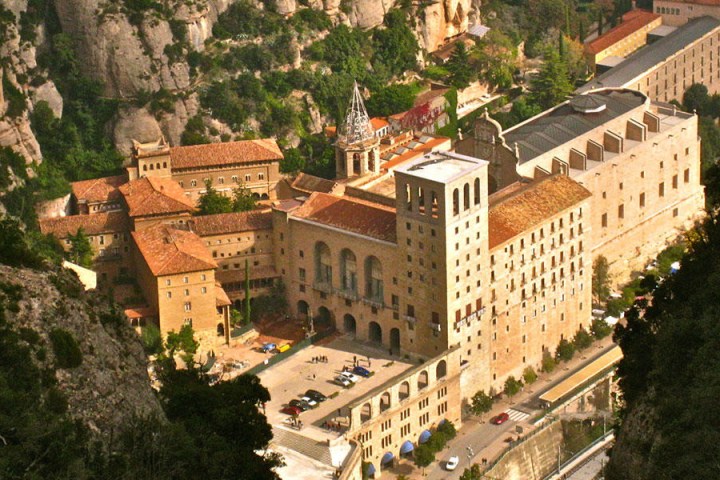 a building with a mountain in the background