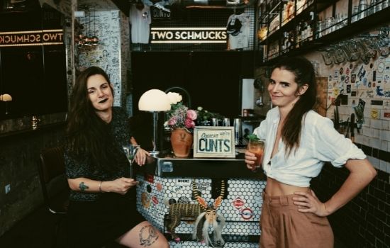 a person standing in front of a store