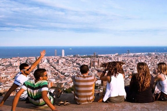 a group of people sitting at a platform