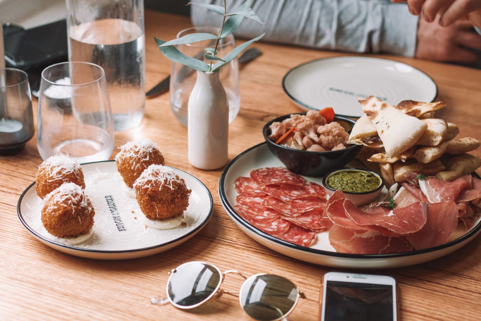 plates of tapas food on a table