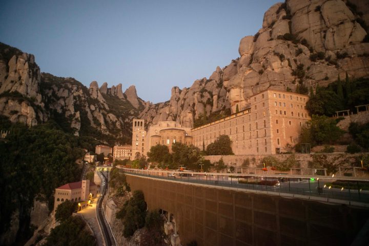 a building with a mountain in the background