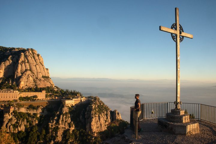 a person standing on top of a mountain