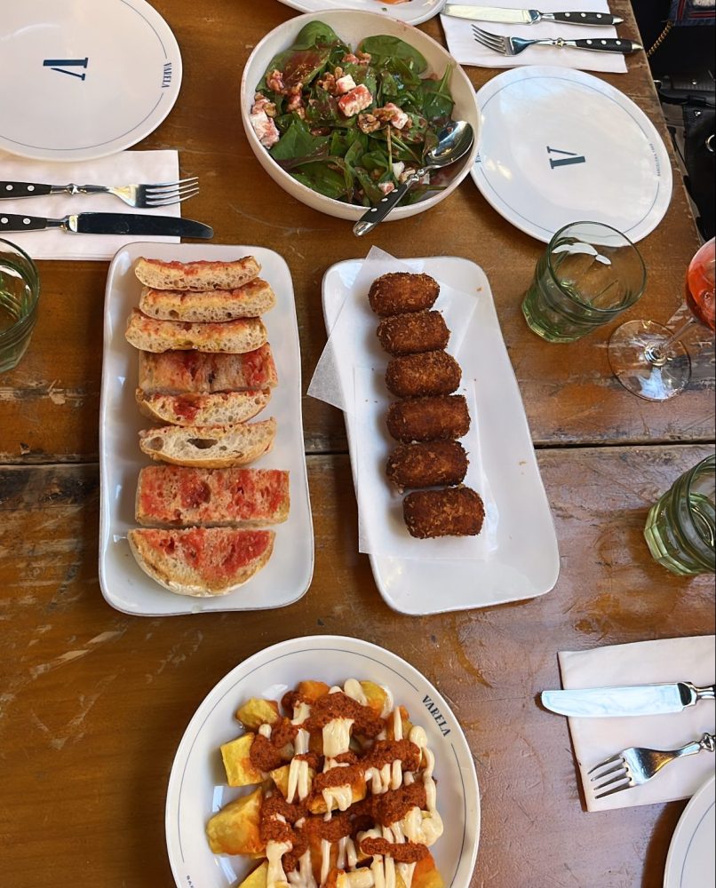 a table topped with different types of food on a plate