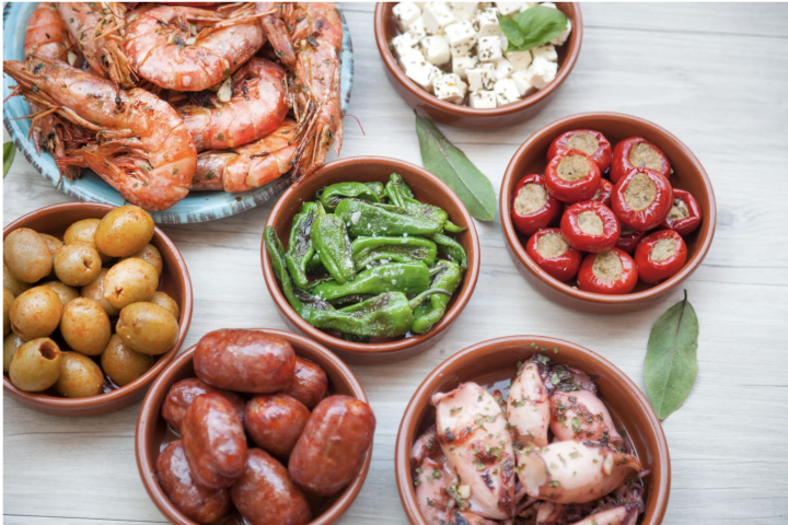 a bowl filled with different types of food on a table