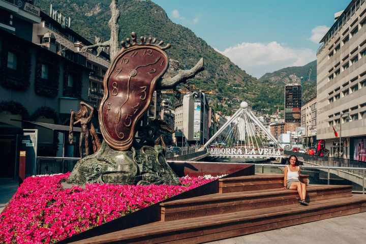 a building with a mountain in the background